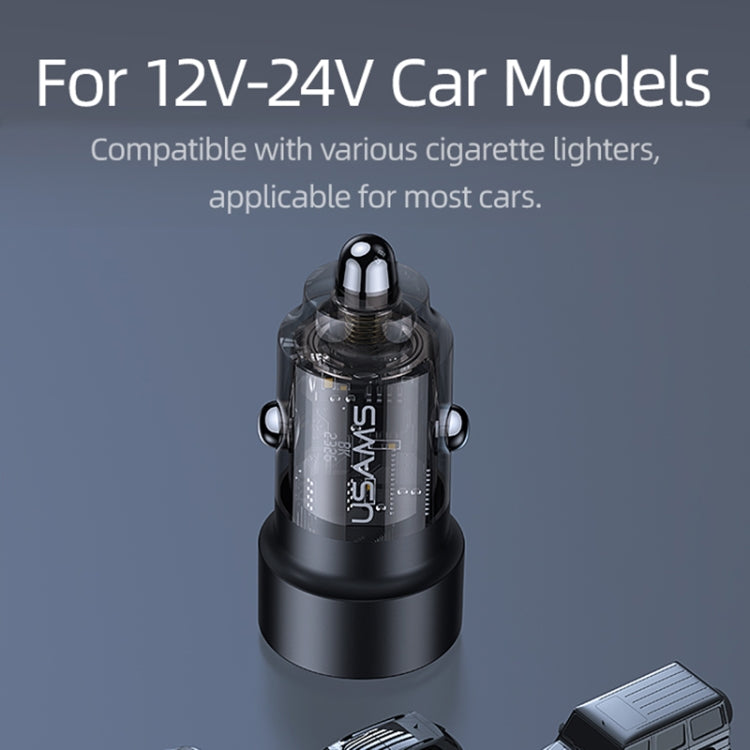 Black dual-port car charger with transparent tube, mounted on car dashboard.