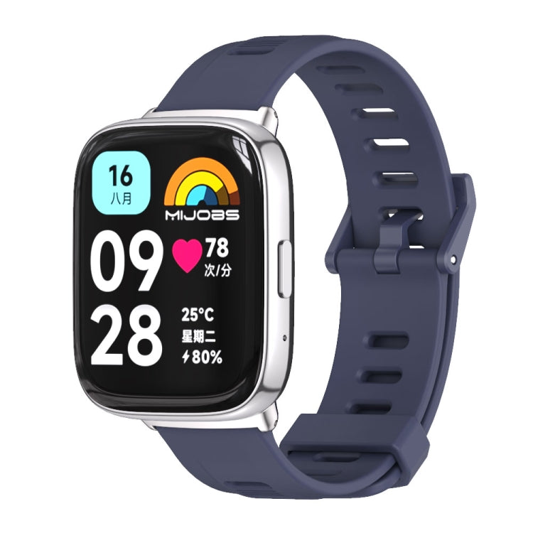 Midnight blue TPU watch band with ventilation holes and metal clasp, smartwatch front