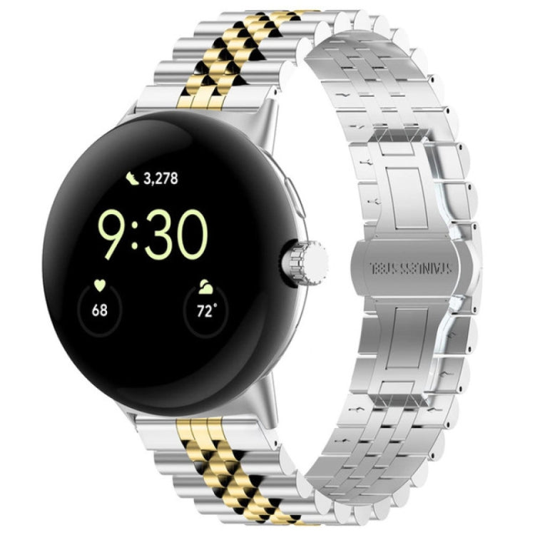 Two-tone stainless steel watch band with black and gold checkered link pattern, metal clasp