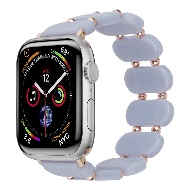Stretch resin watch band with light blue chunky links and rose-gold style pins