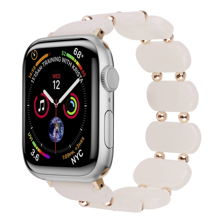 Stretch resin watch band with white translucent chunky links and rose-gold style pins