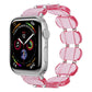 Translucent pink stretch resin watch band with glossy links and metal pin details