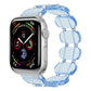 Transparent blue resin watch band with oval links and silver-tone hardware.