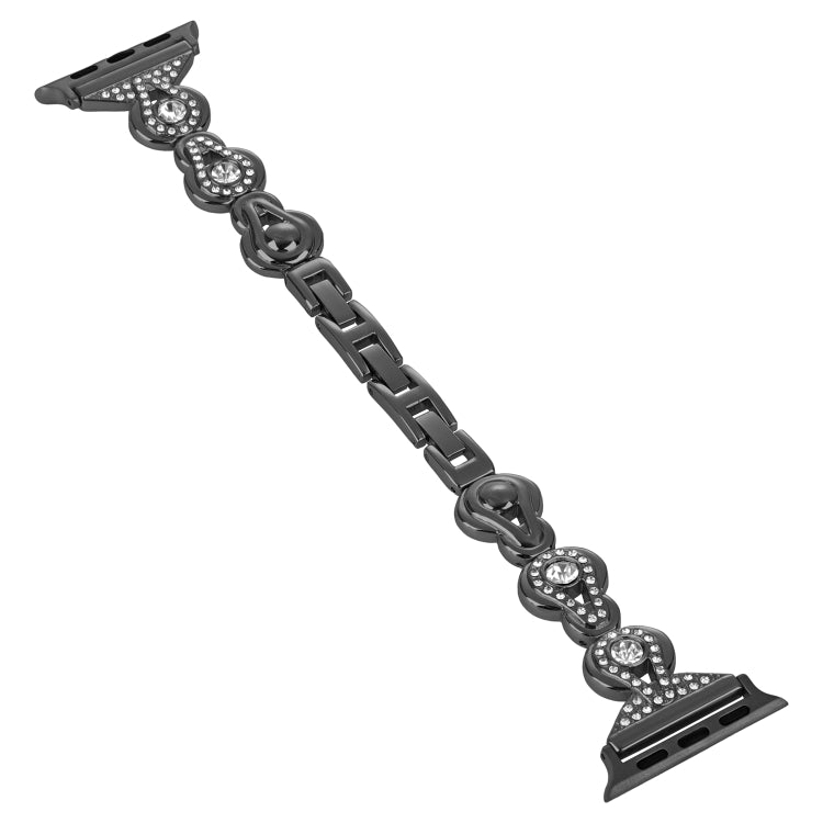 Black metal Apple Watch band with diamond-like gourd crystal link accents