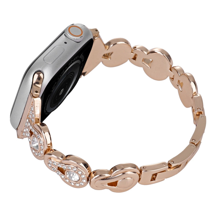 Rose gold diamond-style metal Apple Watch band with oval link bezels and clasp