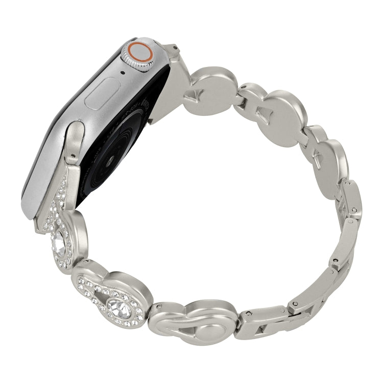 Silver diamond metal watch band with linked scallop charms and rhinestone accents