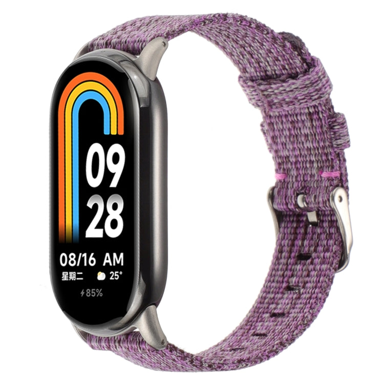 Purple nylon canvas watch band with metal buckle and adjustable strap holes