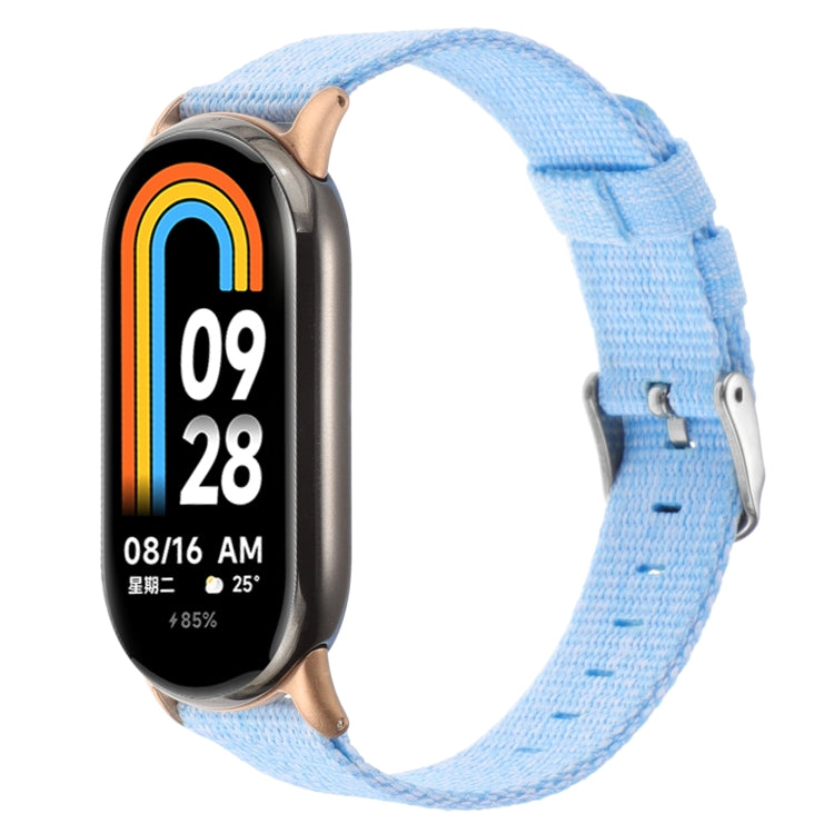 Sky blue nylon canvas watch band with metal buckle and multiple strap holes