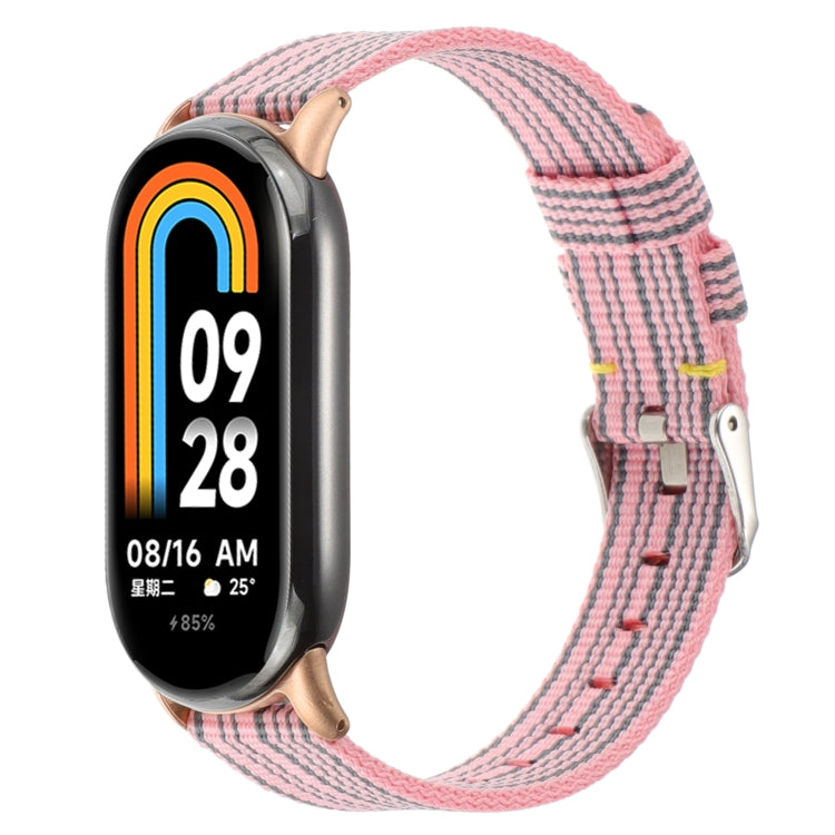 Pink striped nylon canvas watch band with metal buckle and stitch texture