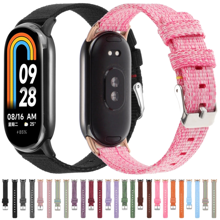 Nylon canvas watch band set shown with black and pink straps, plus assorted colors.