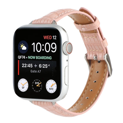 Crocodile leather watch band in pink with stitched edges and buckle closure