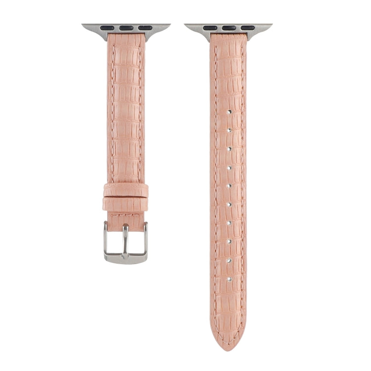 Pink crocodile leather watch band with silver buckle and stitched strap holes