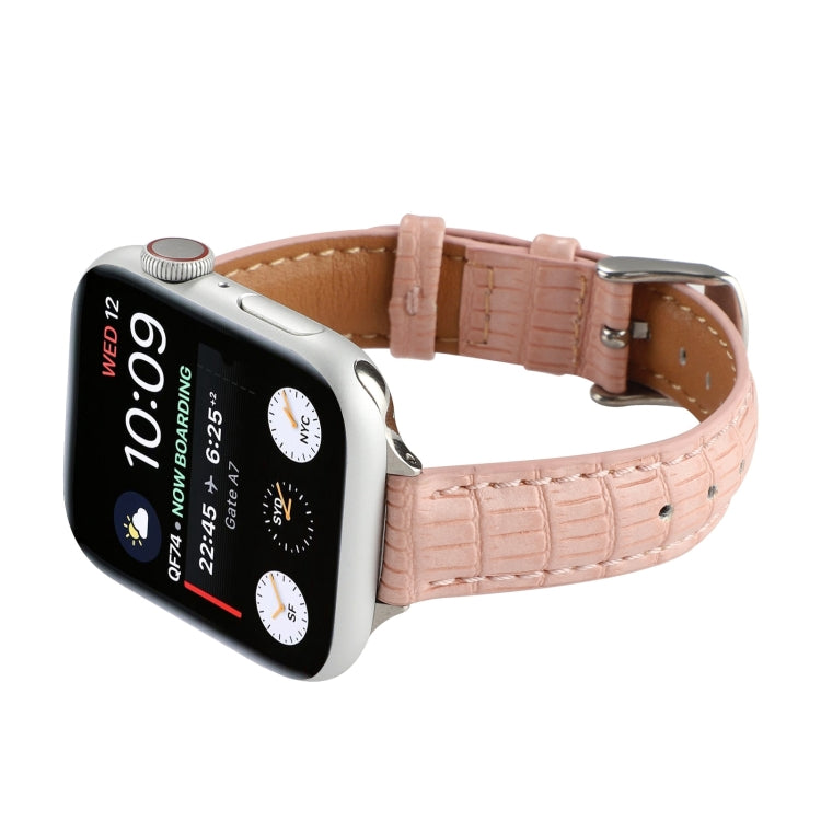 Pink crocodile leather watch band with buckle and stitched strap holes on watch