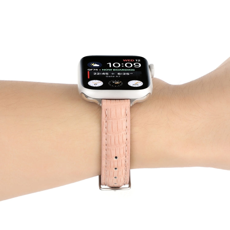 Pink slim crocodile leather watch band with perforations and metal clasp
