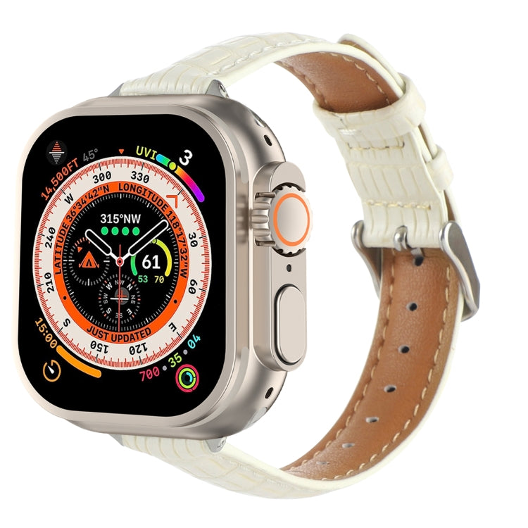 White crocodile leather watch band with stitched edges and buckle holes