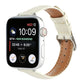 Beige/cream crocodile-texture leather watch band with tan underside and metal buckle