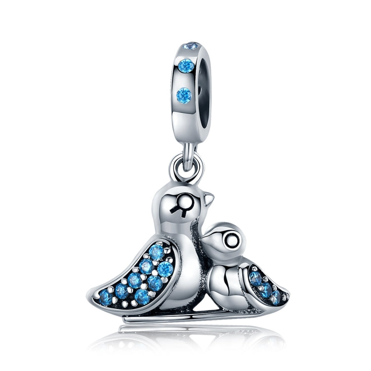 Sterling silver bird charm with blue gemstones