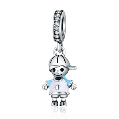 Sterling silver charm bead with boy figure in cap and blue shirt