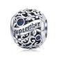 Sterling silver birthstone charm bead, September engraving with blue round gemstones