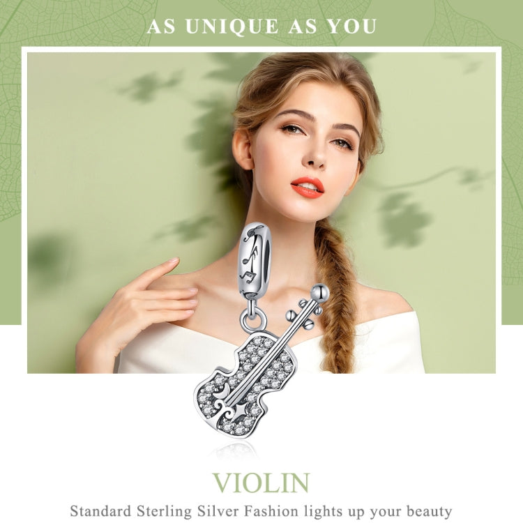 Silver violin pendant with zircon detail and decorative bail