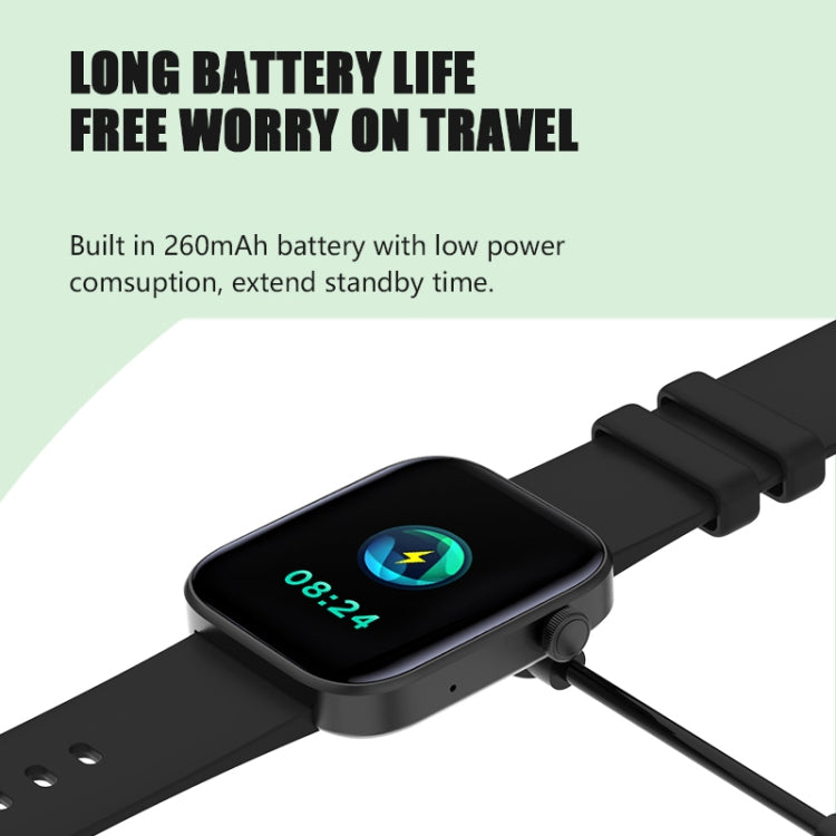 Black smartwatch with dark band, connected to a charging cable and showing time