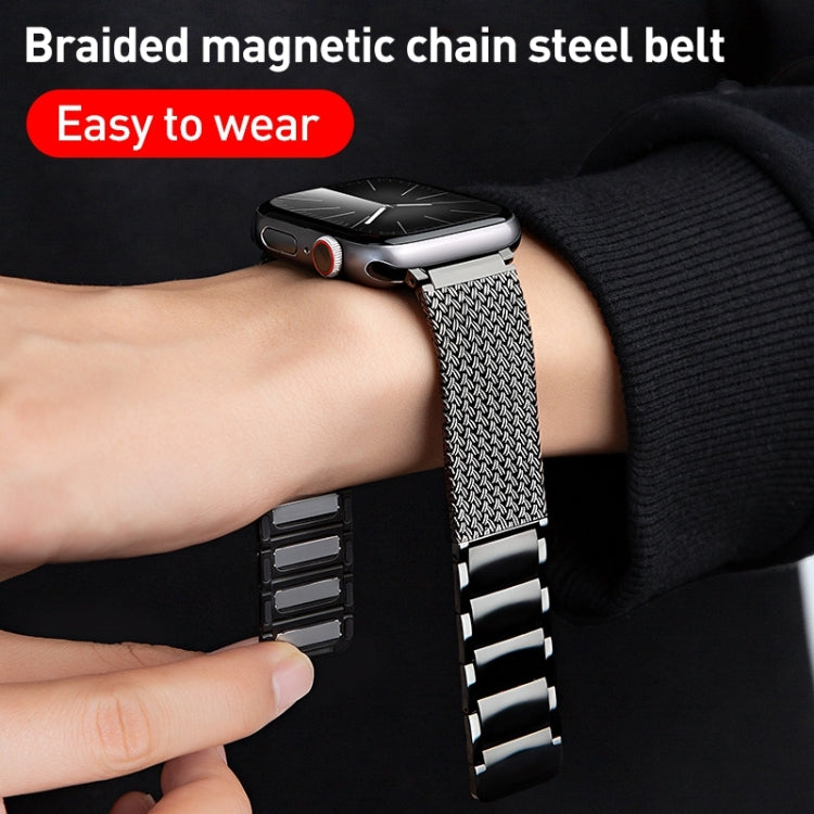 Braided magnetic chain watch band on wrist, black clasp detail and link segments