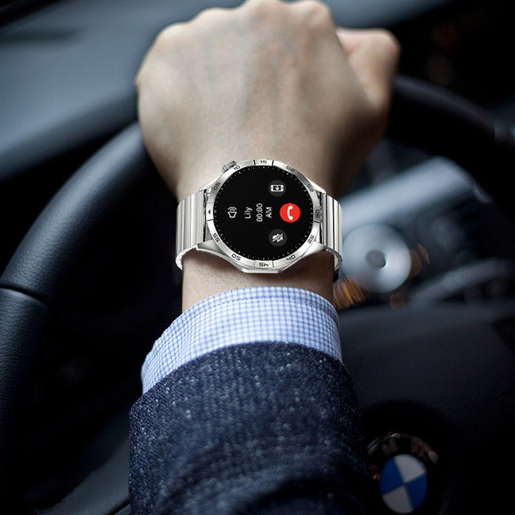 Silver round smart watch on wrist with black display and brown leather strap
