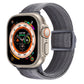 Gray nylon watch band with snap buckle and woven carbon-fiber texture