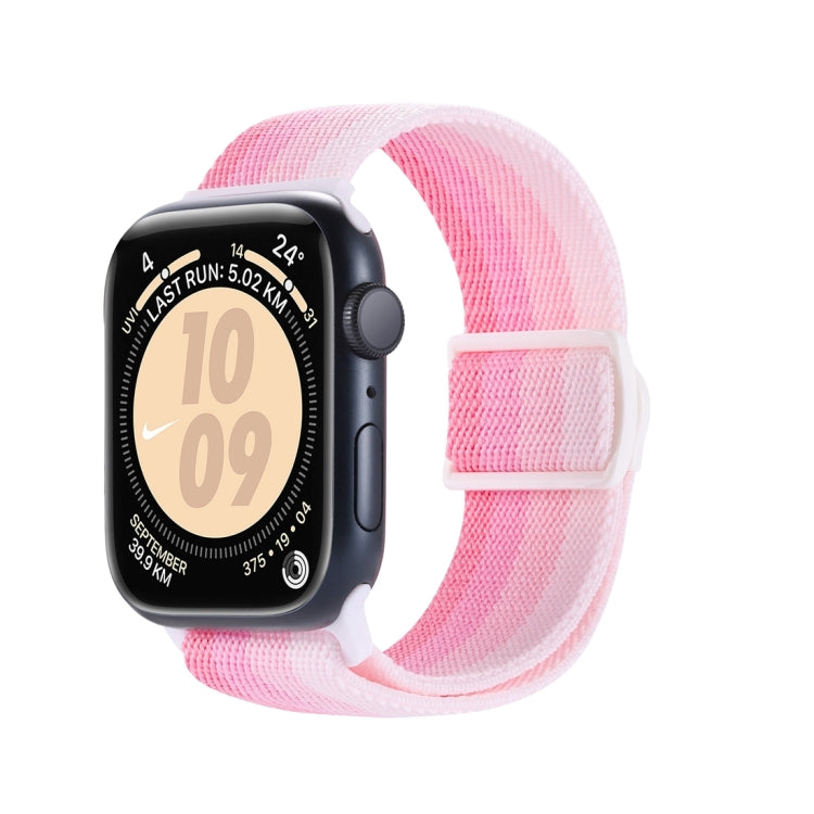Pink gradient nylon watch band with snap buckle, shown on an Apple Watch