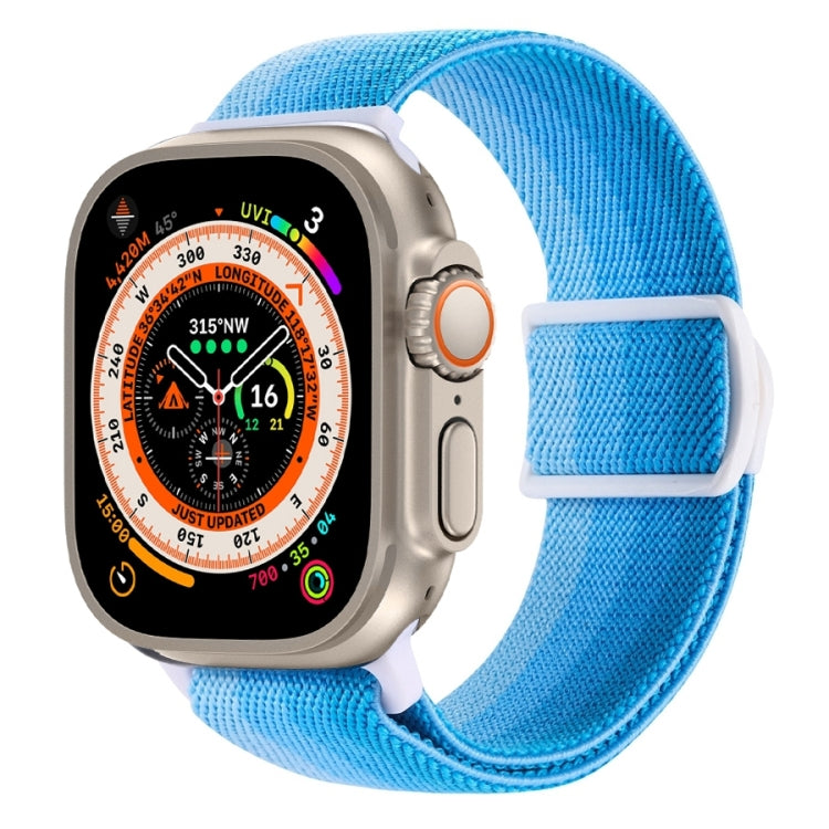 Blue nylon Apple Watch band with textured weave and snap buckle