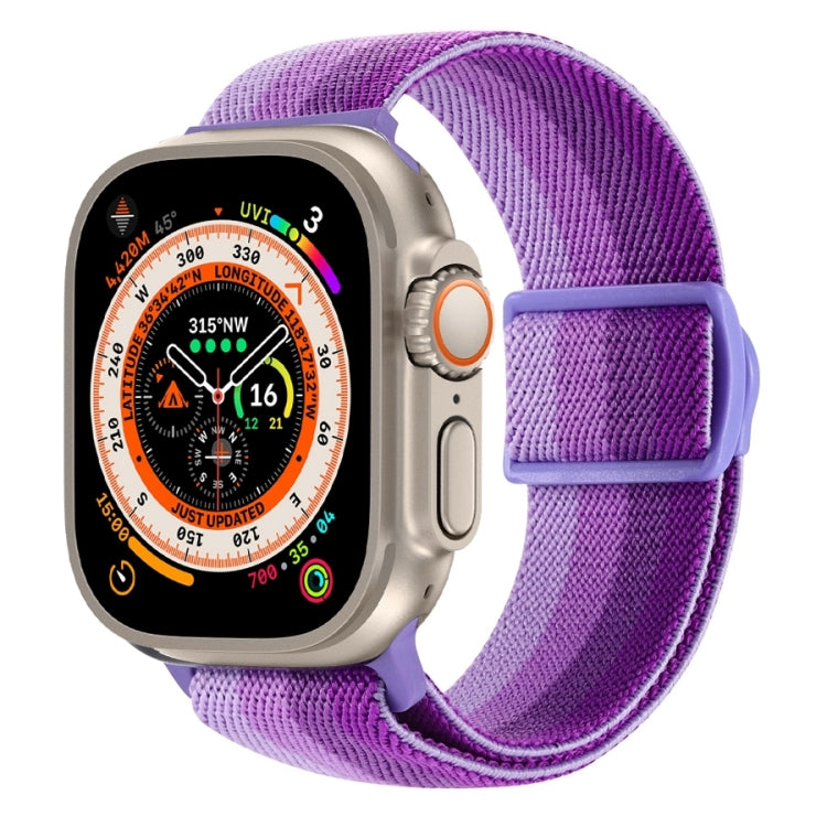 Purple nylon Apple Watch band with adjustable loop closure, shown on a smartwatch.