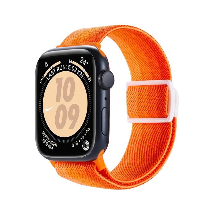 Bright orange nylon Apple Watch band with woven texture and hook-and-loop closure