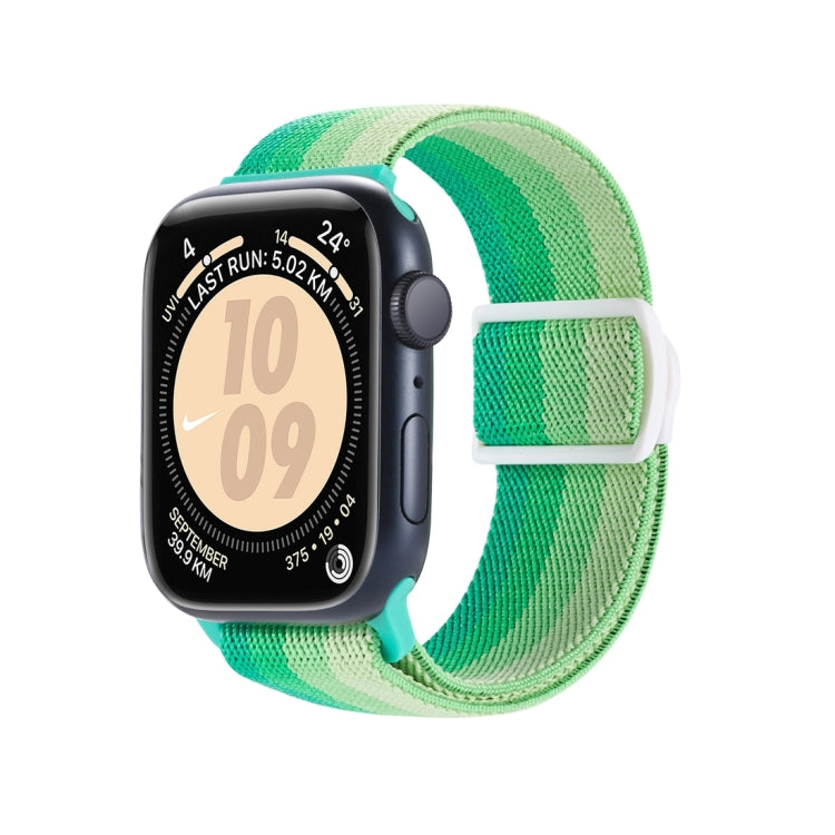 Green gradient nylon Apple Watch band with a white snap buckle