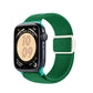 Green nylon watch band with white hook-and-loop closure on a smartwatch