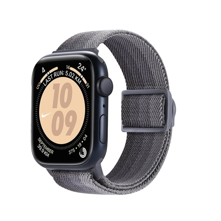 Gray nylon Apple Watch band with carbon-fiber texture and dark snap buckle