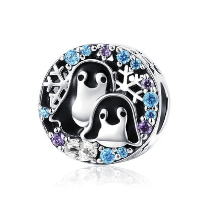 Sterling silver penguin house bracelet charm with enamel penguins and blue/purple stones