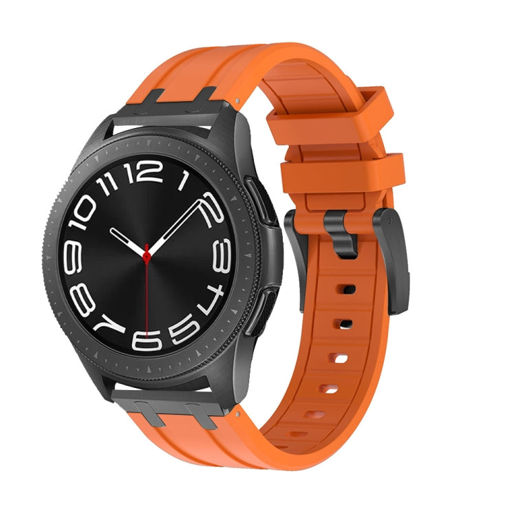 Smartwatch with orange silicone band and black case
