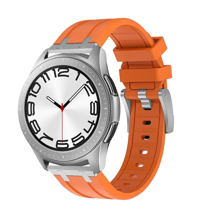 Smartwatch with an orange silicone band, silver case, and white dial