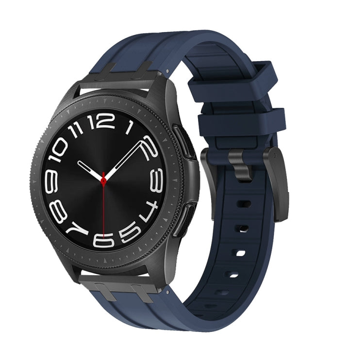 Smartwatch with navy silicone band, buckle, and adjustment holes