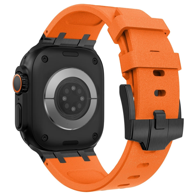 Orange silicone watch band with black hardware, shown on the back of a smartwatch