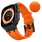 Textured orange silicone watch band with black buckle, shown on a black smartwatch