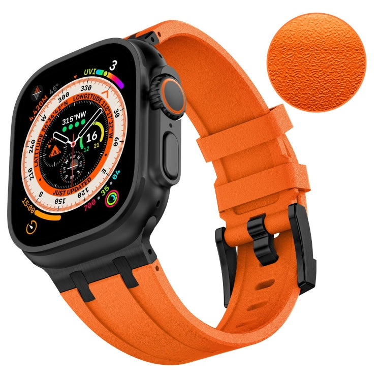 Textured orange silicone watch band with black buckle, shown on a black smartwatch