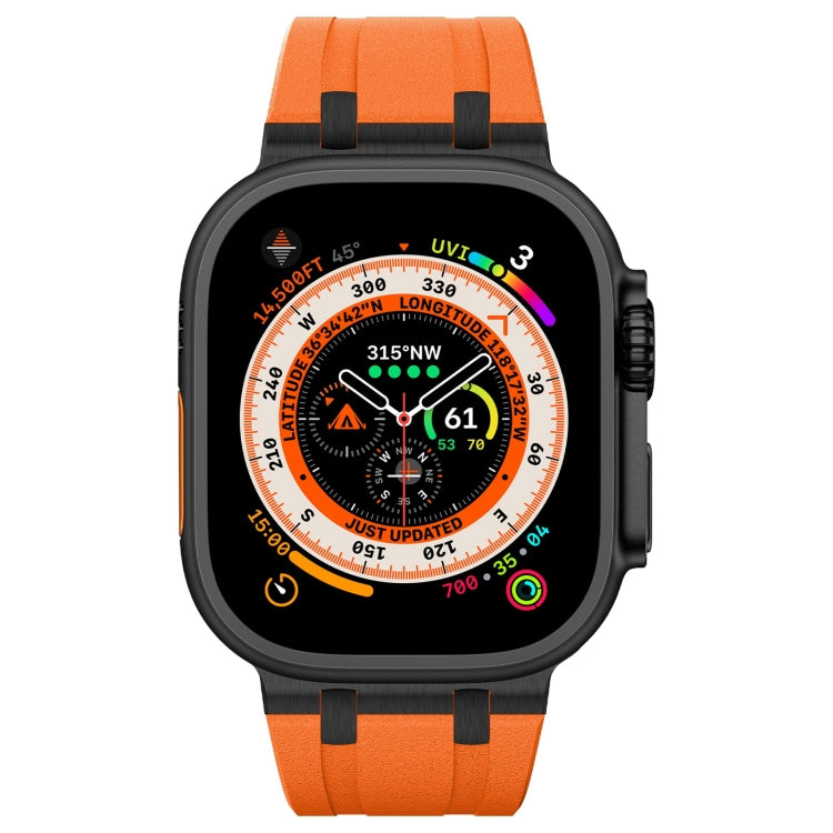 Orange silicone watch band with black accents, shown on a black smartwatch