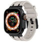 Apple Watch with light gray silicone band and black watch case