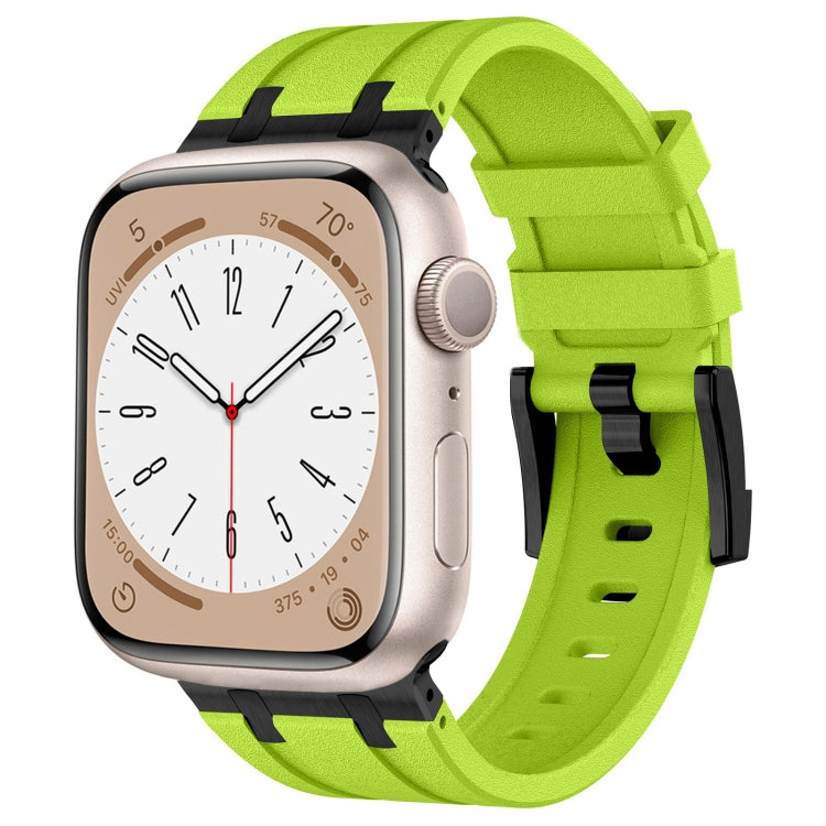Apple Watch with lime green silicone band and black connectors
