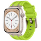 Apple Watch with a bright green liquid silicone band and silver-tone buckle