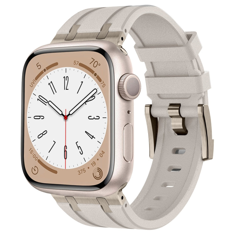 Light gray silicone Apple Watch band with silver connectors, shown fitted to a watch