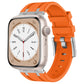Orange silicone Apple Watch band with silver connectors, shown fitted to a watch