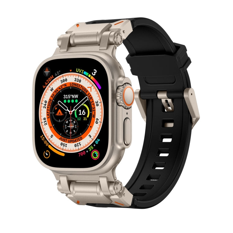 Black TPU Apple Watch band with light metallic hardware and a light watch case.