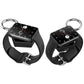 Black smartwatch charging keychain shown charging a watch from two angles